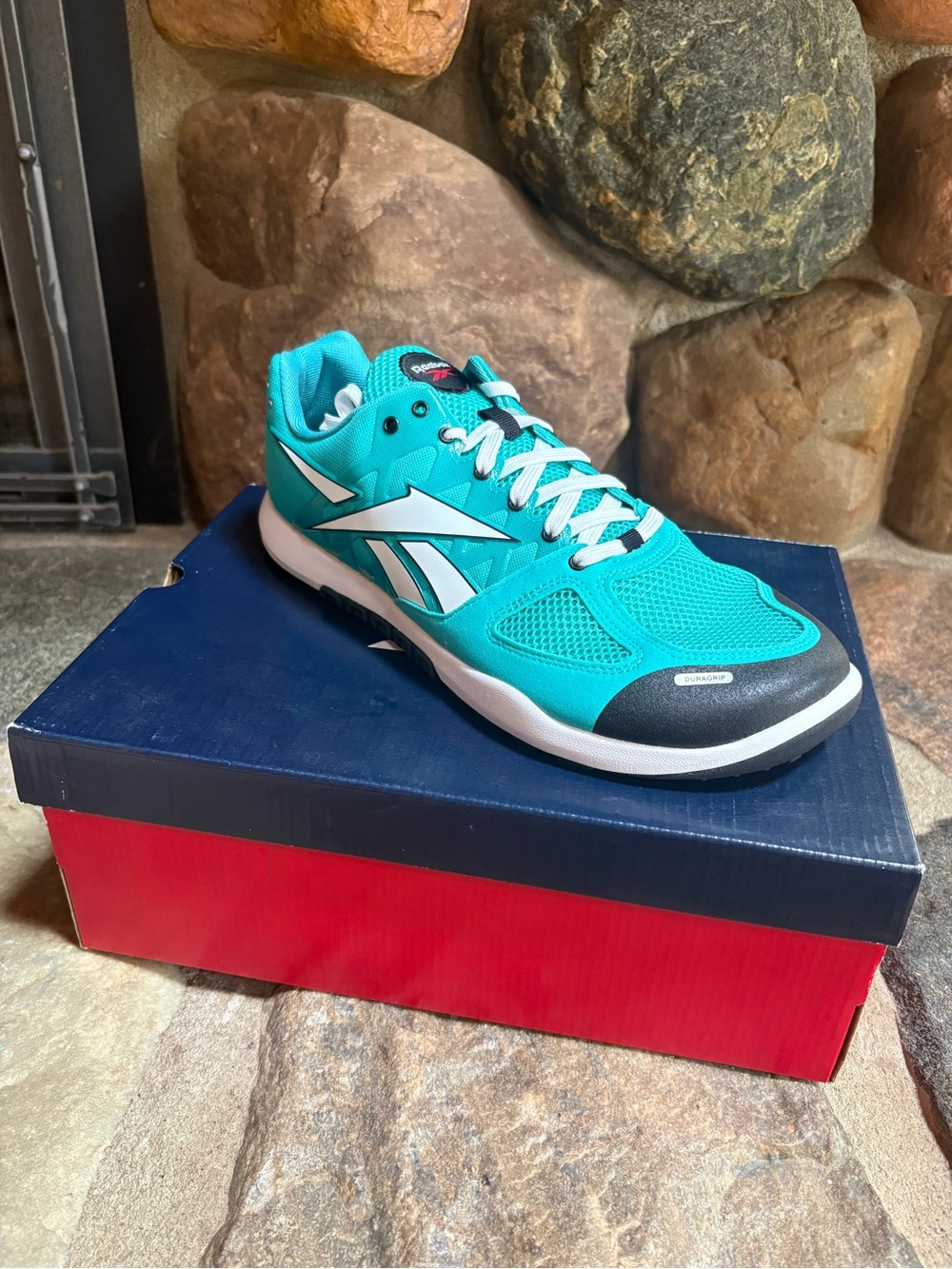 Reebok Men’s Turquoise Athletic Sneaker with White Accents